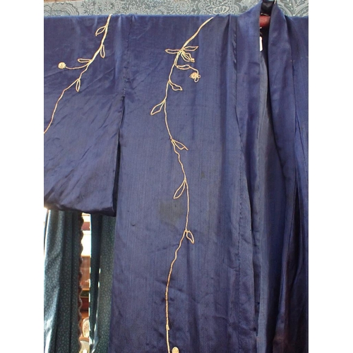 68 - A BLUE SILK KIMONO WITH GOLD COLOURED EMBROIDERY