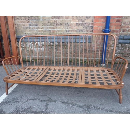 770 - AN ERCOL STICK-BACK THREE-SEATER SOFA 197cm wide (sold as a frame, with cushions available for patte... 