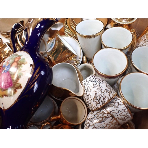 87 - A COLLECTION OF GOLD DECORATED TEA AND COFFEE SERVICES with other similar ceramics