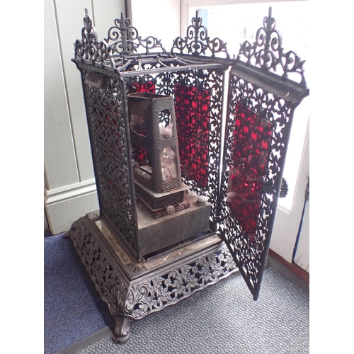 9 - A VICTORIAN CAST-IRON CONSERVATORY HEATER with elaborately pierced sides, and spreading base with mi... 