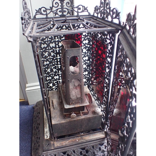 9 - A VICTORIAN CAST-IRON CONSERVATORY HEATER with elaborately pierced sides, and spreading base with mi... 