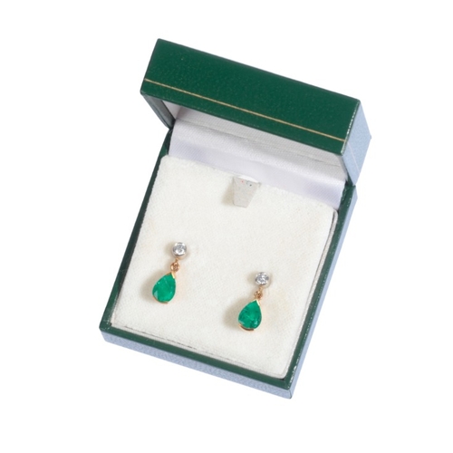 180 - A PAIR OF EMERALD AND DIAMOND DROP EARRINGS

in 18ct gold, each set with round brilliant cut diamond... 