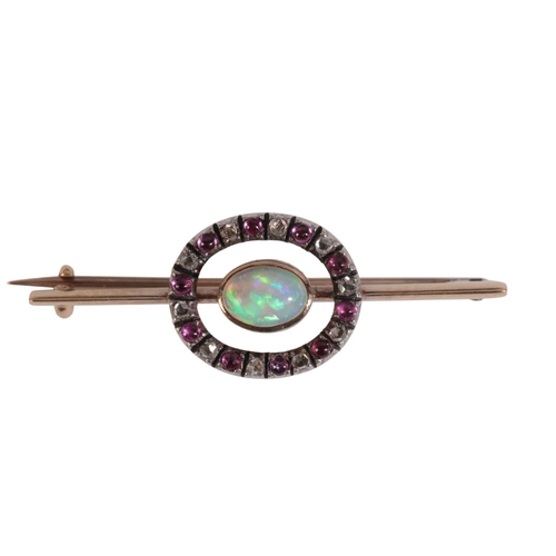 194 - AN ANTIQUE VICTORIAN OPAL, RUBY AND DIAMOND BROOCH

in silver on 9ct gold, set centrally with an opa... 