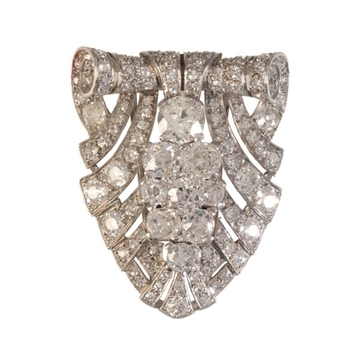 197 - AN ART DECO DIAMOND BROOCH

in platinum, c.1930s, set with old cut diamonds totalling c.5.80 carats ... 