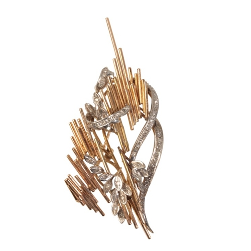 198 - A VINTAGE MODERNIST DIAMOND BROOCH

in 14ct yellow and white gold, set throughout with single cut di... 