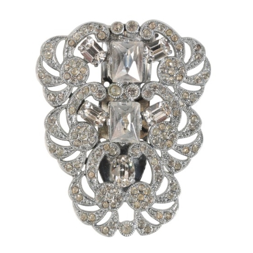 201 - A LARGE PASTE BROOCH

in base metal, set throughout with mixed cut and round cut paste stones over a... 