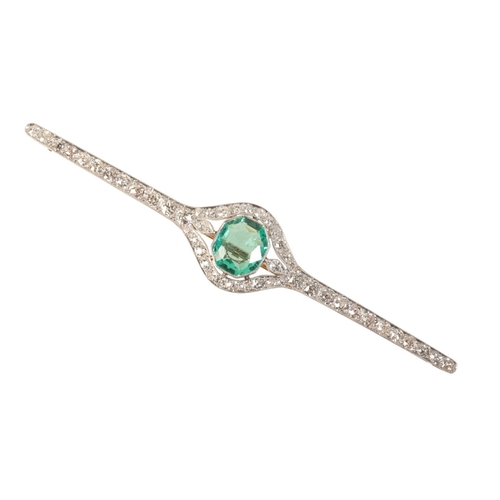 208 - A VINTAGE EMERALD AND DIAMOND BROOCH

in 18ct yellow gold and platinum, set with an octagonal mixed ... 