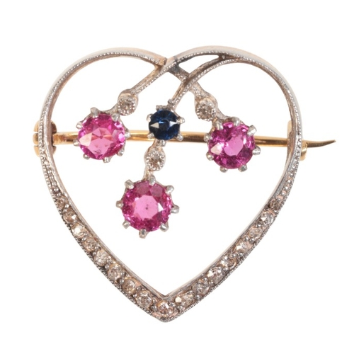 215 - A SYNTHETIC RUBY, SAPPHIRE AND DIAMOND HEART BROOCH

in 18ct gold and silver, set with three princip... 