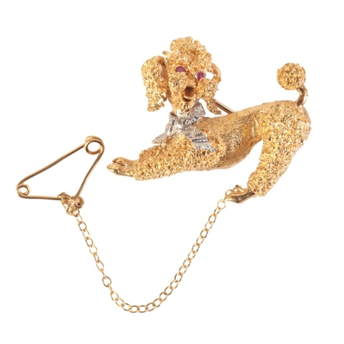 217 - A VINTAGE RUBY AND DIAMOND POODLE BROOCH

in 18ct gold, with ruby set eyes and diamond set collar, t... 