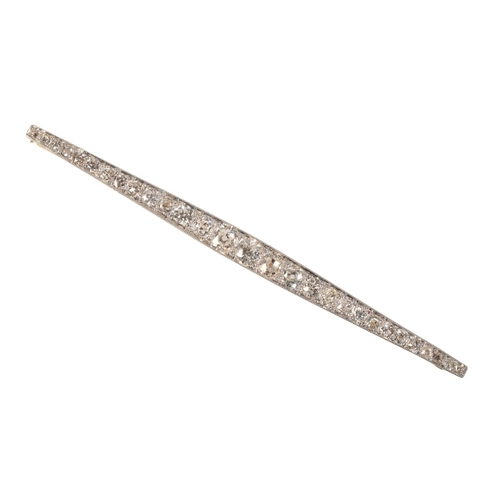 220 - A FRENCH ANTIQUE DIAMOND BAR BROOCH

in 18ct gold and platinum, set throughout with old mine cut dia... 