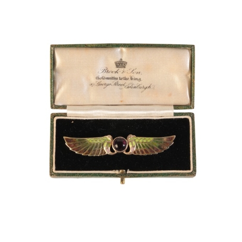 222 - AN ART NOUVEAU PLIQUE-À-JOUR AND TOURMALINE BROOCH

in 9ct yellow gold, set to the centre with a tou... 