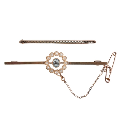 223 - AN ANTIQUE EDWARDIAN AQUAMARINE AND SEED PEARL BAR BROOCH

in 15ct gold, set with an oval cut aquama... 