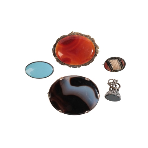 227 - A GROUP LOT OF FOUR BROOCHES

including a banded agate brooch in a setting of 9ct gold, 5.5cm; toget... 