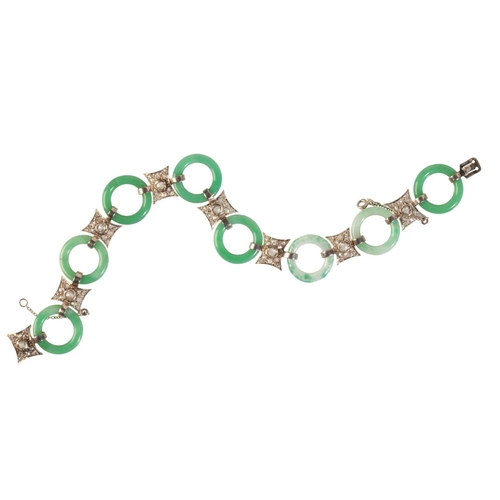233 - A BELLE-EPOQUE JADEITE JADE AND DIAMOND BRACELET

in platinum, comprising a series of jadeite jade r... 
