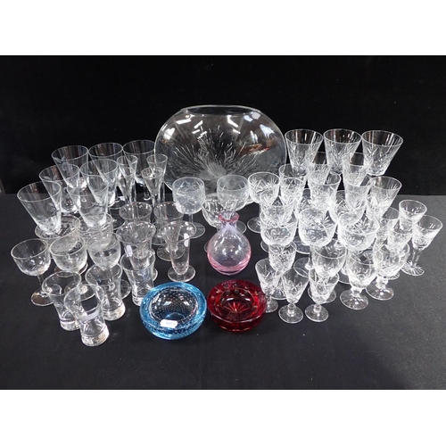 100 - A COLLECTION OF GLASS WARE mostly table glass, a controlled bubble dish and other items (various sty... 