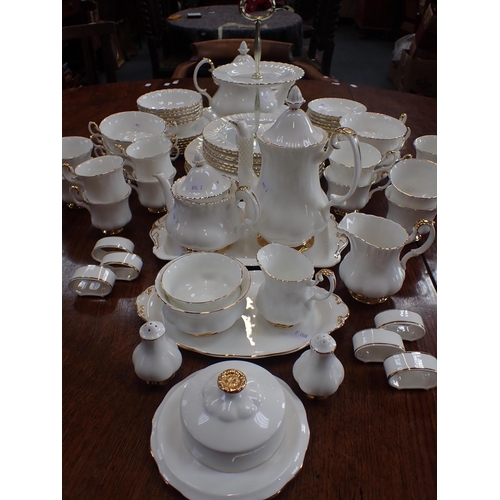 184 - A ROYAL ALBERT 'VAL D'OR' DINNER SERVICE with tea and coffee ware