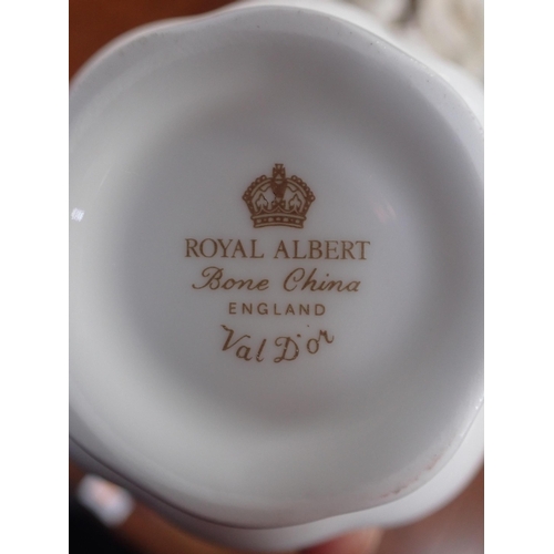 184 - A ROYAL ALBERT 'VAL D'OR' DINNER SERVICE with tea and coffee ware