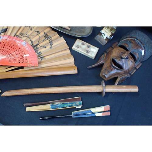 206 - WALKING STICKS, AFRICAN CARVED WOOD fans, a baseball bat and other wooden items