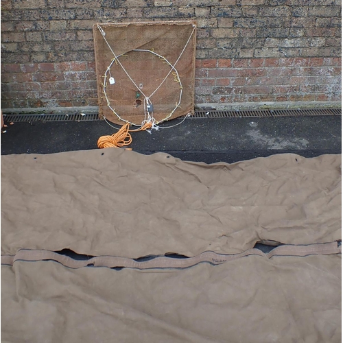 213 - A VINTAGE ARMY KIT COVER c.1950's, together with a square fishing net, 70 x 70cm (2)