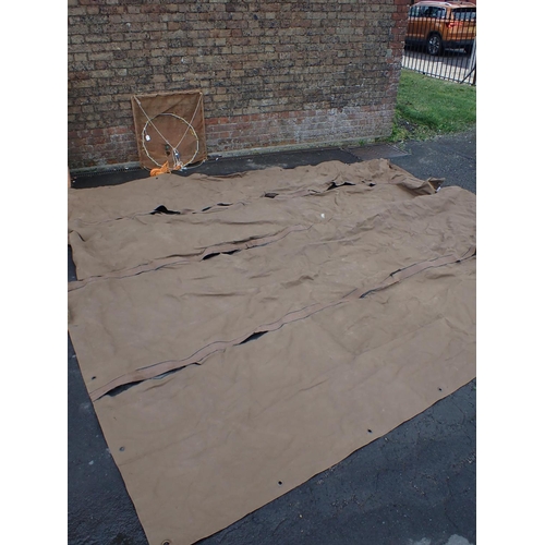 213 - A VINTAGE ARMY KIT COVER c.1950's, together with a square fishing net, 70 x 70cm (2)