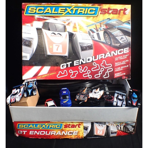 223 - 2 SCALEXTRIC START GT ENDURANCE SETS both boxed but opened, thought to be complete. One with 4 addit... 