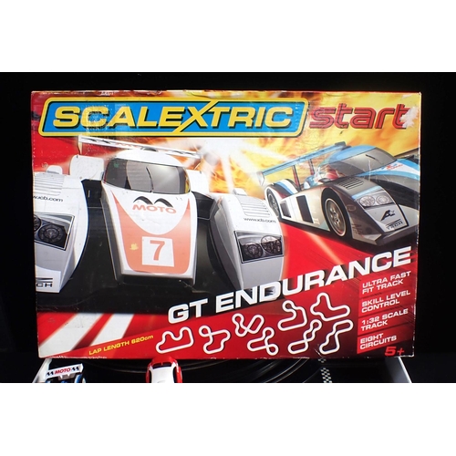 223 - 2 SCALEXTRIC START GT ENDURANCE SETS both boxed but opened, thought to be complete. One with 4 addit... 