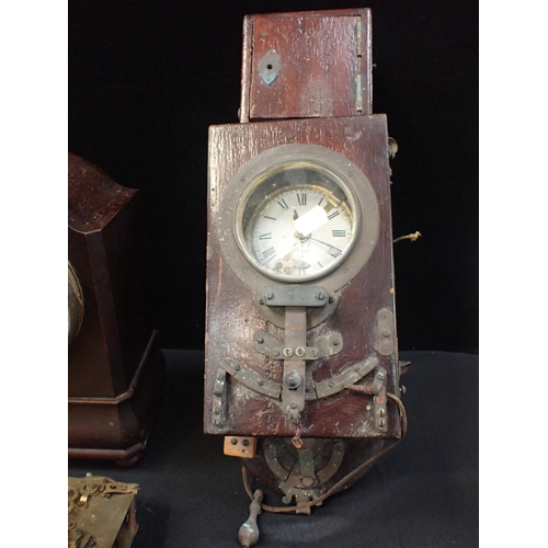 300 - AN EARLY ELECTRIC CLOCK with an Art Deco mantel clock and other clock and bell components; one possi... 