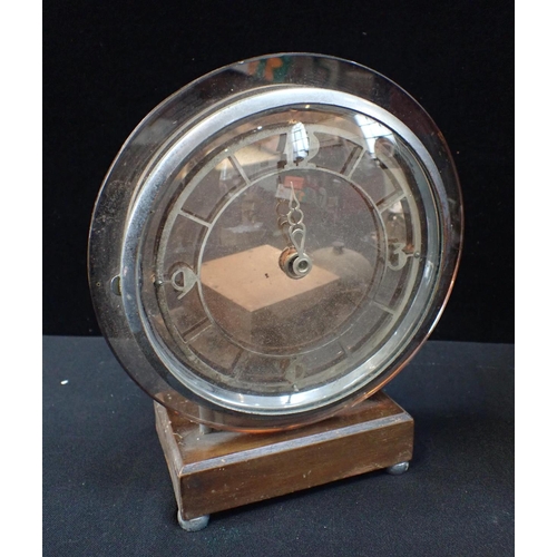 300 - AN EARLY ELECTRIC CLOCK with an Art Deco mantel clock and other clock and bell components; one possi... 