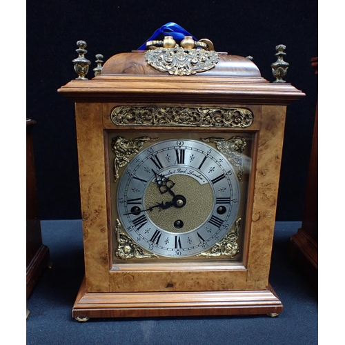 301 - A MAHOGANY CASED ELLIOTT CLOCK with a similar in walnut by Thwaites and Reed and another, the larges... 