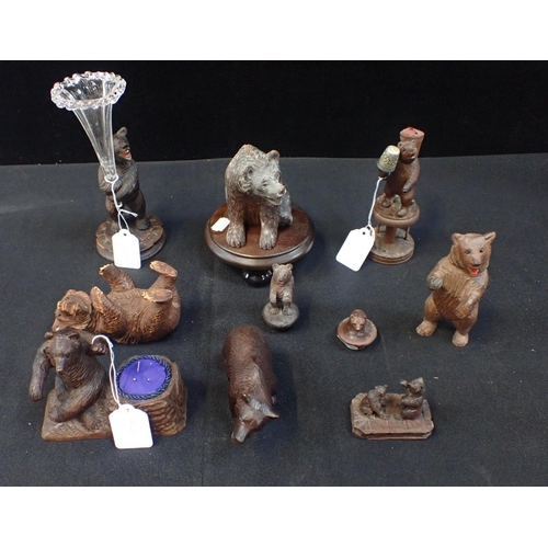 333 - A COLLECTION OF BLACK FOREST BEARS including two with sewing accessories and one with a glass trumpe... 