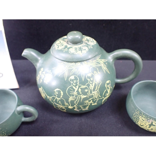 431 - A CHINESE TEASET with a painted fan