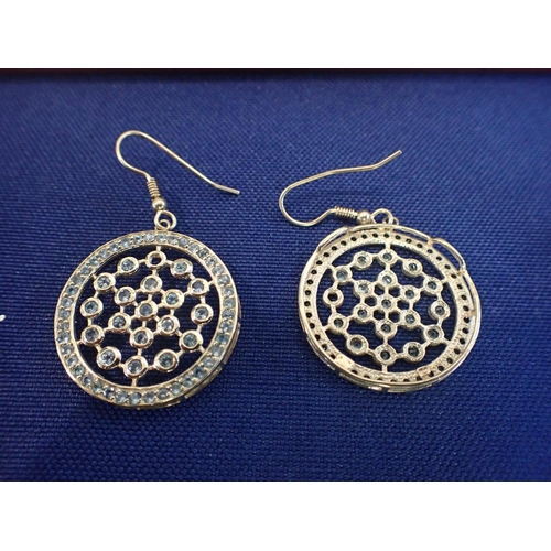 495 - A PAIR OF CHRYOLITE DROP EARRINGS set throughout with round cut chrysolite stones and a cased faux p... 