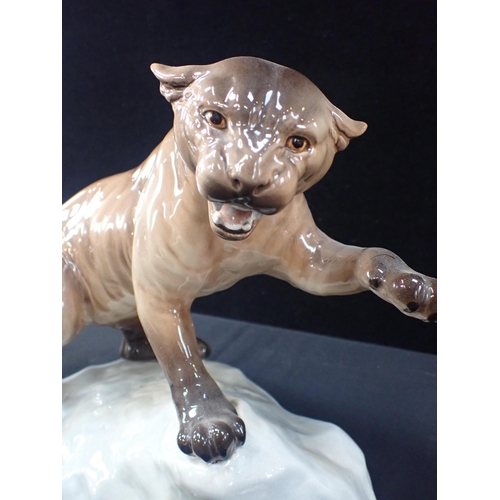 51 - A BESWICK MOUNTIAN LION