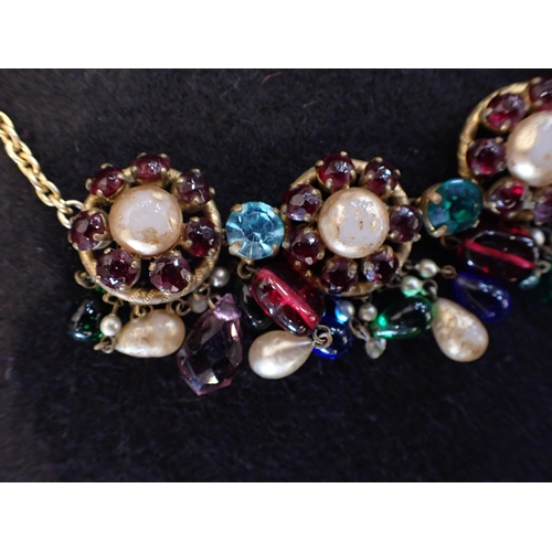 530 - CHRISTIAN DIOR: A NECKLACE SET WITH MULTICOLOURED STONES (pearlised surface worn)