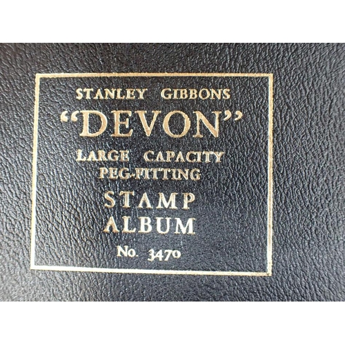 606 - A STANLEY GIBBONS 'DEVON' ALBUM, COMMEMORATIVES and historical stamps, duty stamps, railway, US thre... 