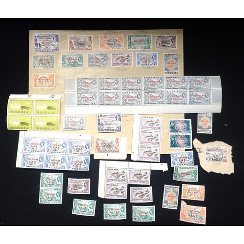 608 - A PART SHEET OF NIGERIA/ CAMEROON CANCELLED 2d STAMPS one £1 stamp, one 10/- stamp, and others, mint... 