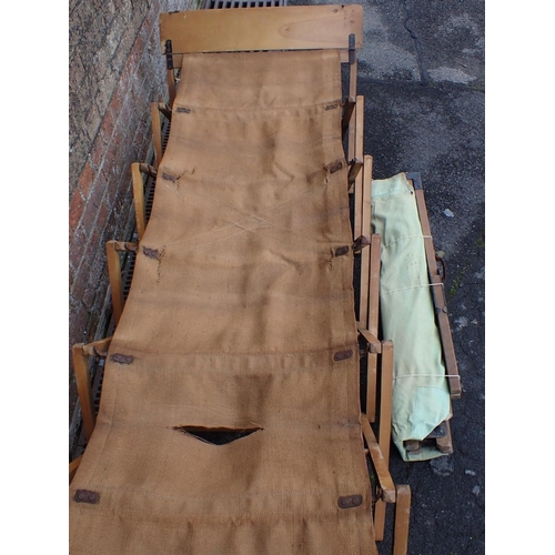 628 - A 'BAVEYWARE IS BEST' CAMP BED (canvas a/f) and a WWII camp bed (2)