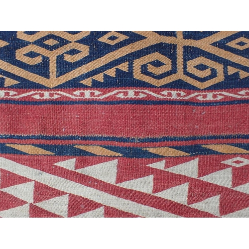 791 - AN ANTIQUE FINE FLATWEAVE RUG worked in geometrically patterned bands, possibly N. African 195 x 180... 