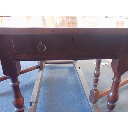 843 - A LARGE OAK GATELEG TABLE fitted a drawer, 18th century and later 153 x 180cm (open) (repairs, refin... 