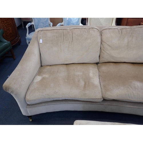 855 - A LAURA ASHLEY COUNTRY HOUSE STYLE SOFA curved, with sloping arms and turned legs, on brass casters,... 