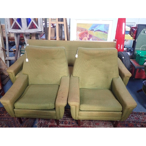 868 - A 1960s MID-CENTURY MODERN THREE-PIECE SUITE (with sofa bed) with beech underframe and angled teak l... 