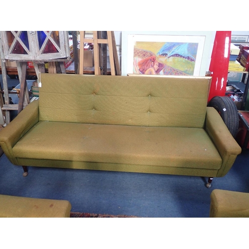 868 - A 1960s MID-CENTURY MODERN THREE-PIECE SUITE (with sofa bed) with beech underframe and angled teak l... 