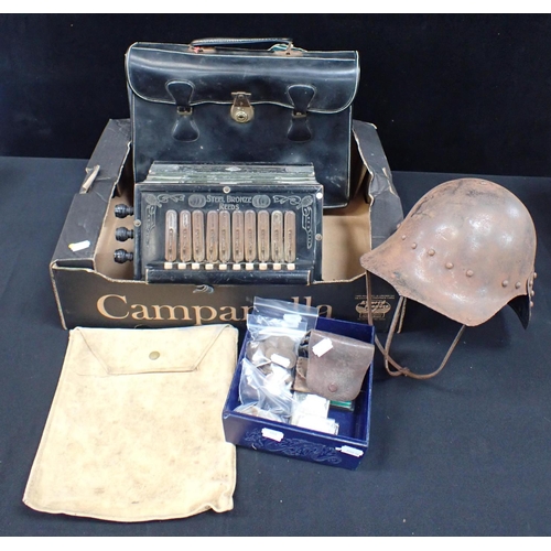 89 - A GERMAN ACCORDION, A TIN HELMET a briefcase, a quantity of coins and other items