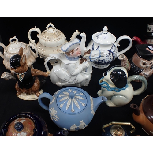 99 - A COLLECTION OF TEAPOTS Doulton Lambeth stoneware, Wedgwood Jasper, Spode Italian, plus various nove... 