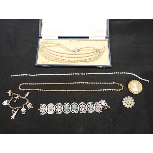 470 - A SILVER CHARM BRACELET, A SMALL PEARL NECKLACE WITH 9CT CLASP an Indian white metal bracelet, and o... 