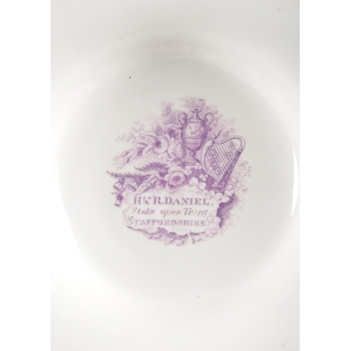 201 - AN H & R DANIEL SHREWSBURY SHAPE ARMORIAL CREAM BOWL AND COVER

the white ground with green and gilt... 