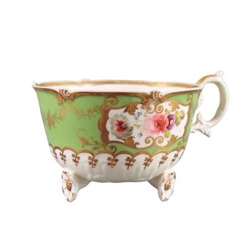 208 - AN H & R DANIEL C-SCROLL CUP AND SAUCER

pattern number 4369, the Shrewsbury green ground decorated ... 