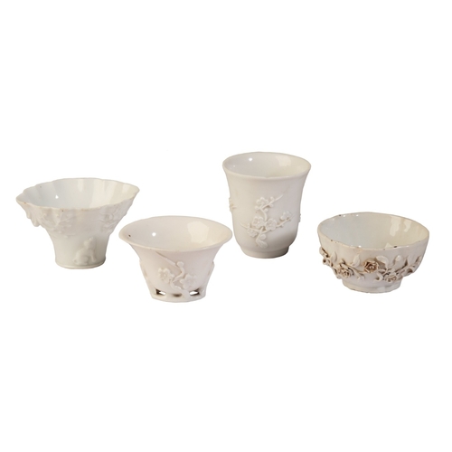 107 - THREE BLANC DE CHINE LIBATION CUPS

19th century, all decorated with blossoming prunus, the largest ... 