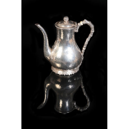 14 - A CHINESE EXPORT SILVER COFFEE POT

impressed marks to the underside for makers Jiu Jiang and Tu Mao... 