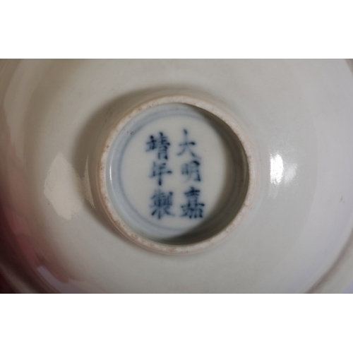 141 - A CHINESE MONOCHROME WHITE-GLAZED BOWL

19th century, bearing six character Jiajing mark to the base... 